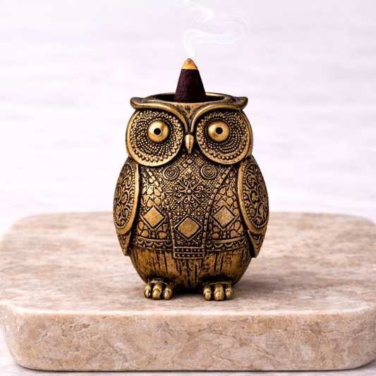 Owl incense burner resin 14cm x 10cm with incense cone on beige stone slab