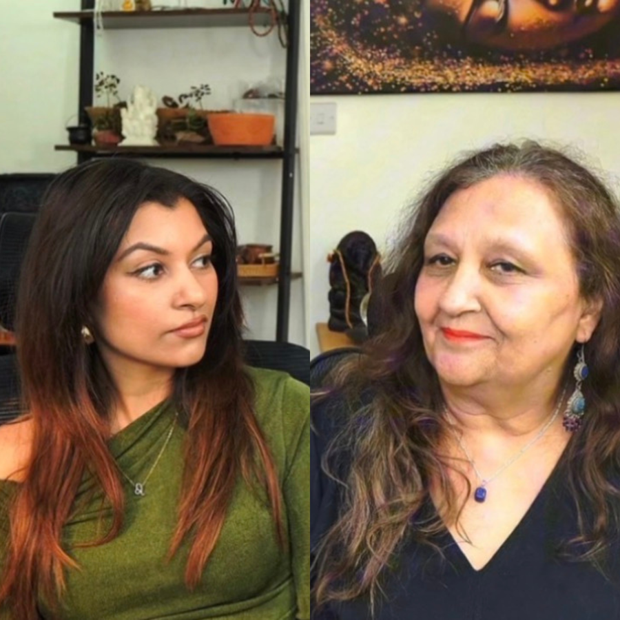 Two women in a podcast studio in split-screen, looking at each other in conversation with shelves and artwork in the background