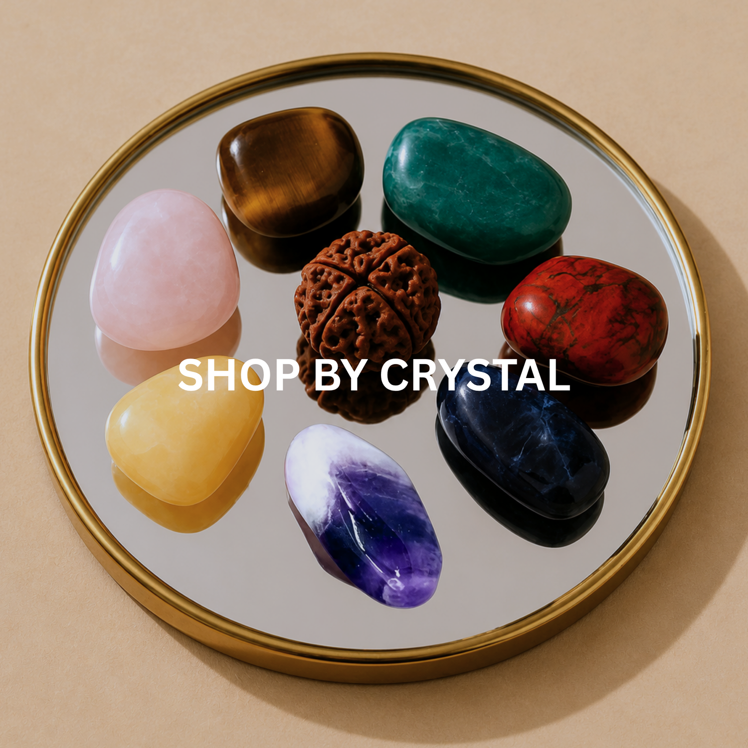 Shop by crystal collection image featuring crystals on gold tray with text overlay by Moon Sutras