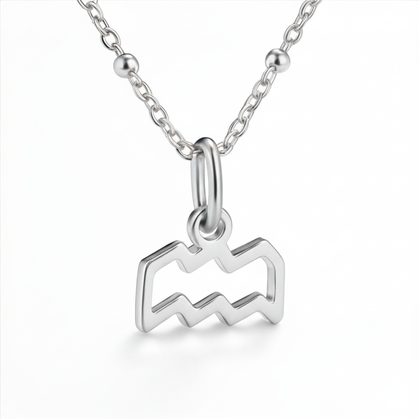 Aquarius silverplated necklace close up showing silver zodiac symbol pendant