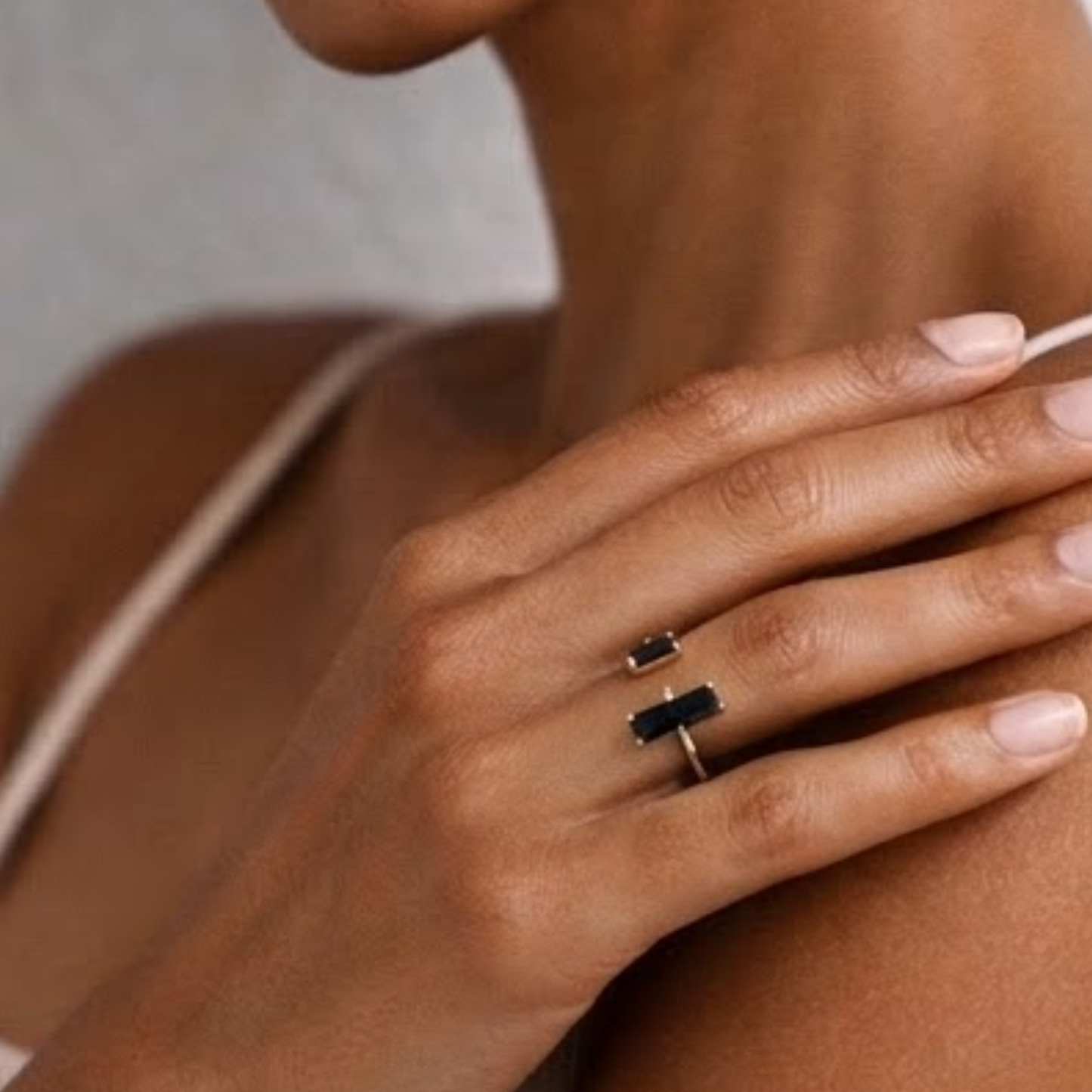Black obsidian ring close up on hand
