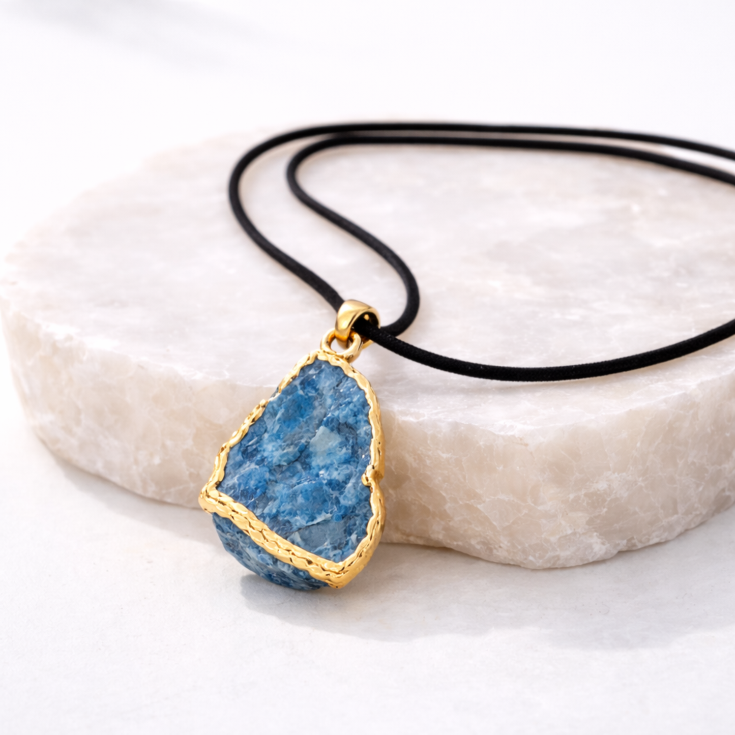 Blue Apatite necklace on natural stone