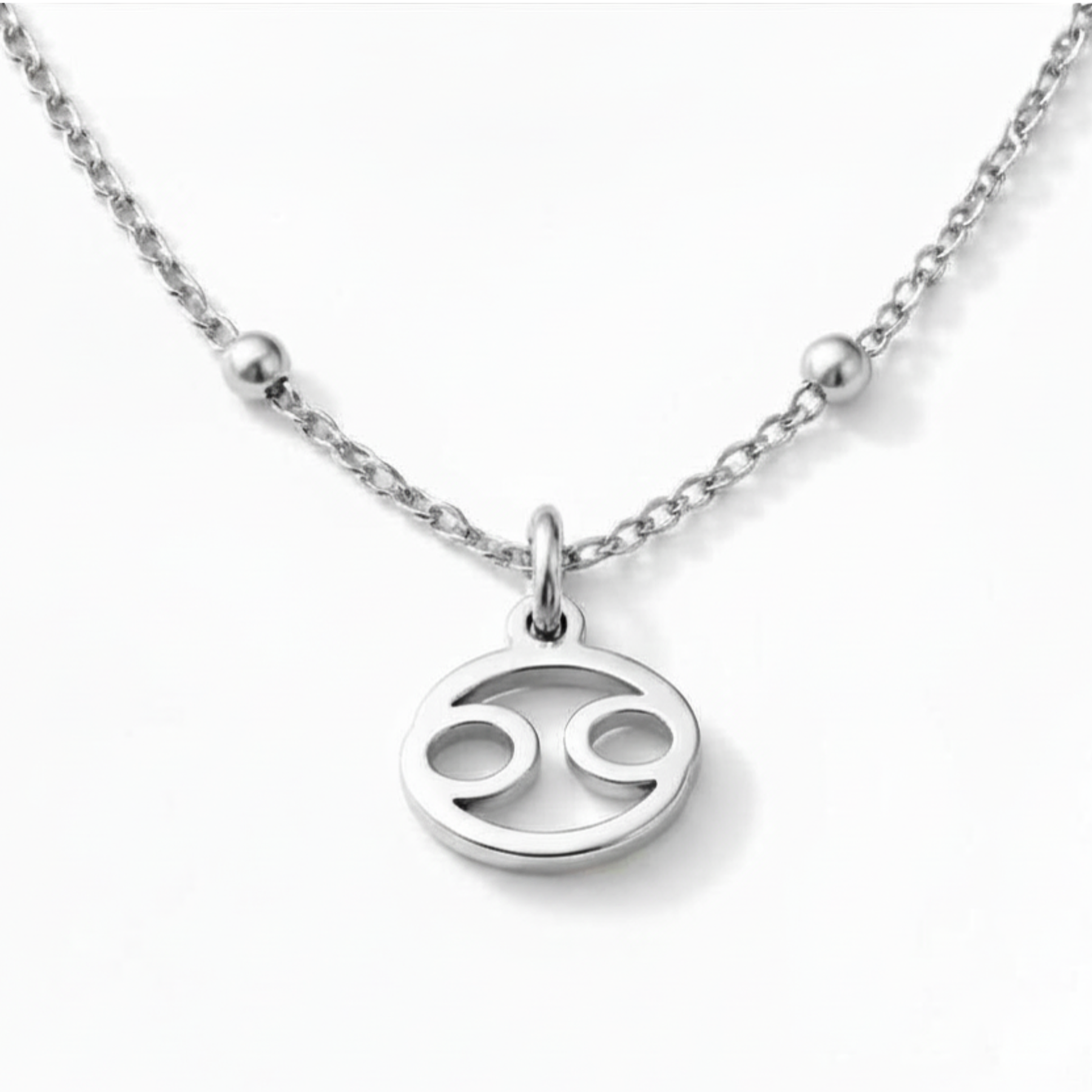 Cancer necklace silver zodiac symbol pendant on gold chain by Moon Sutras