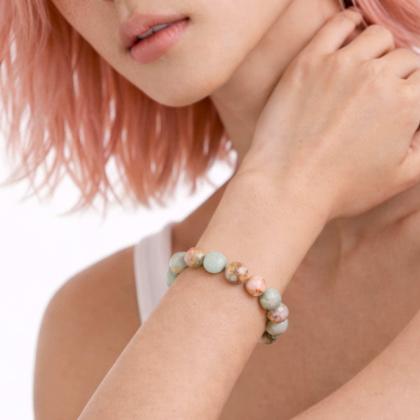 Close up of Shoushan crystal bracelet worn on wrist