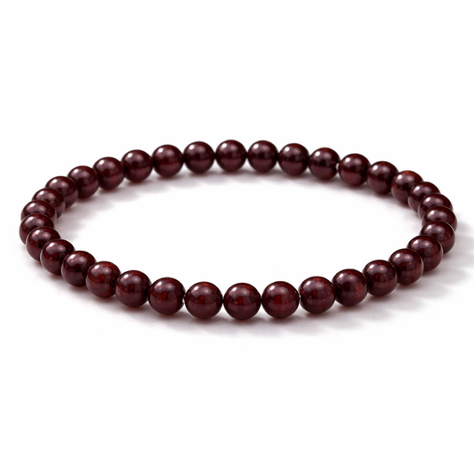 Garnet crystal bead bracelet on white background