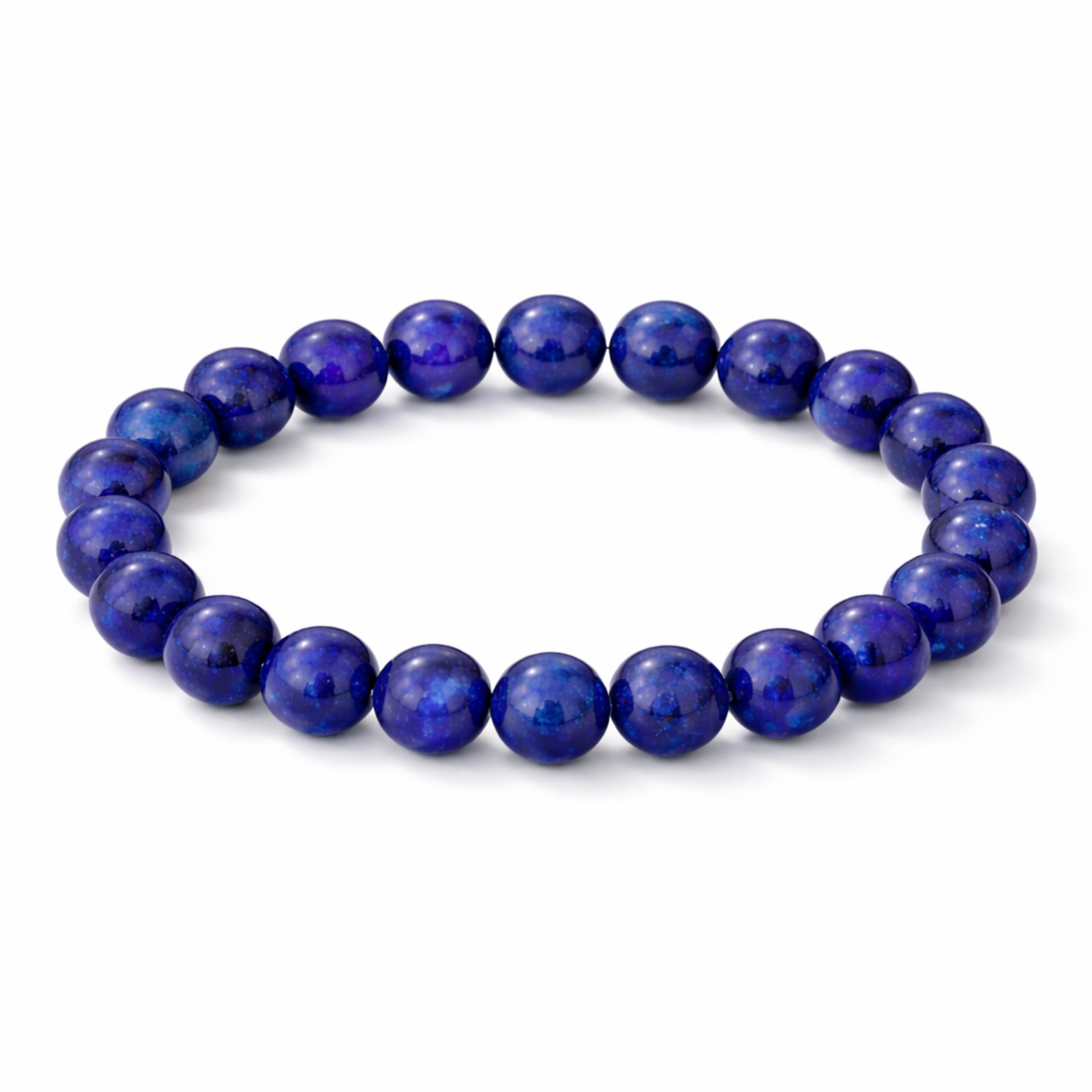 Lapis lazuli beaded bracelet isolated on white studio background deep blue polished round beads by Moon Sutras