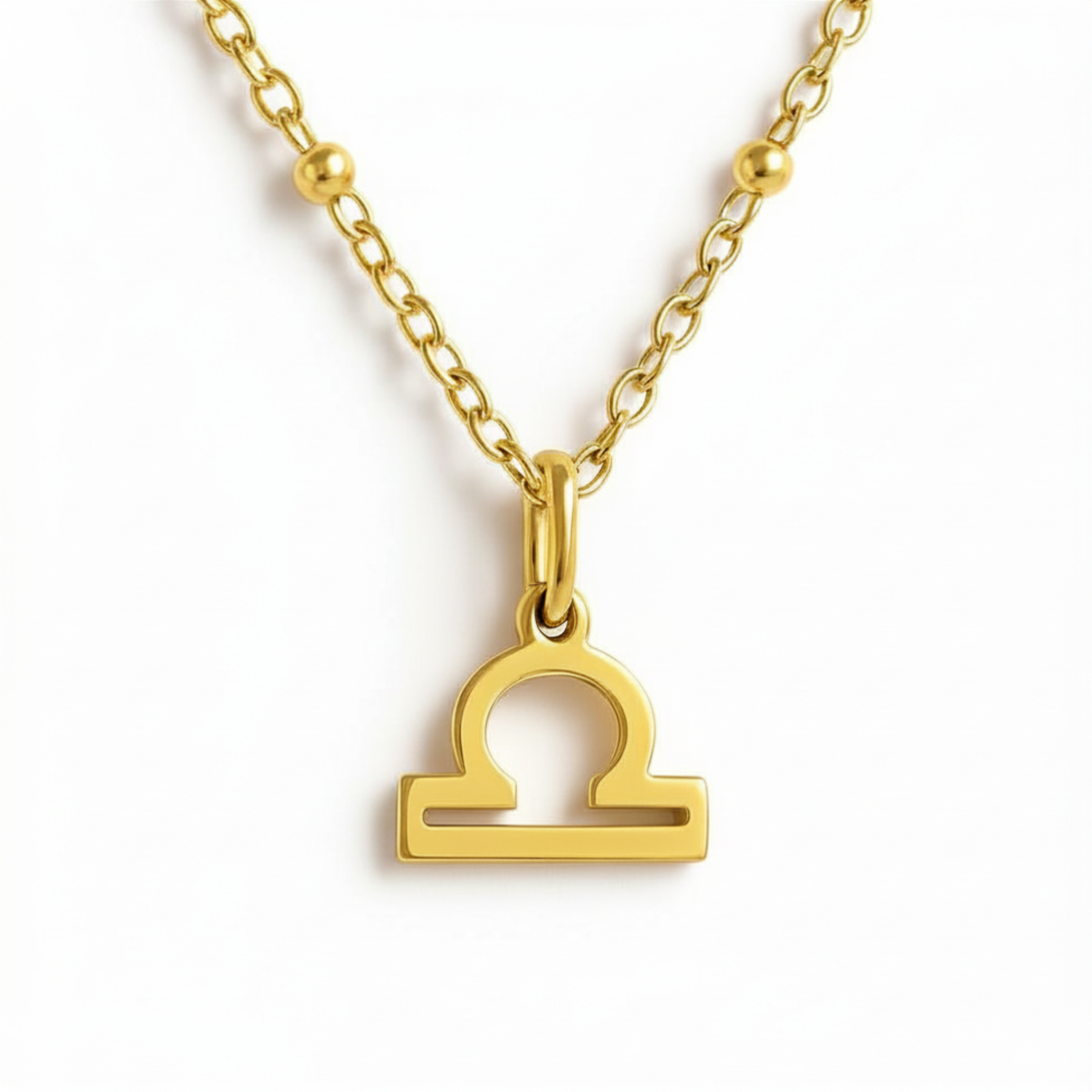 Libra zodiac necklace gold pendant on gold chain by Moon Sutras