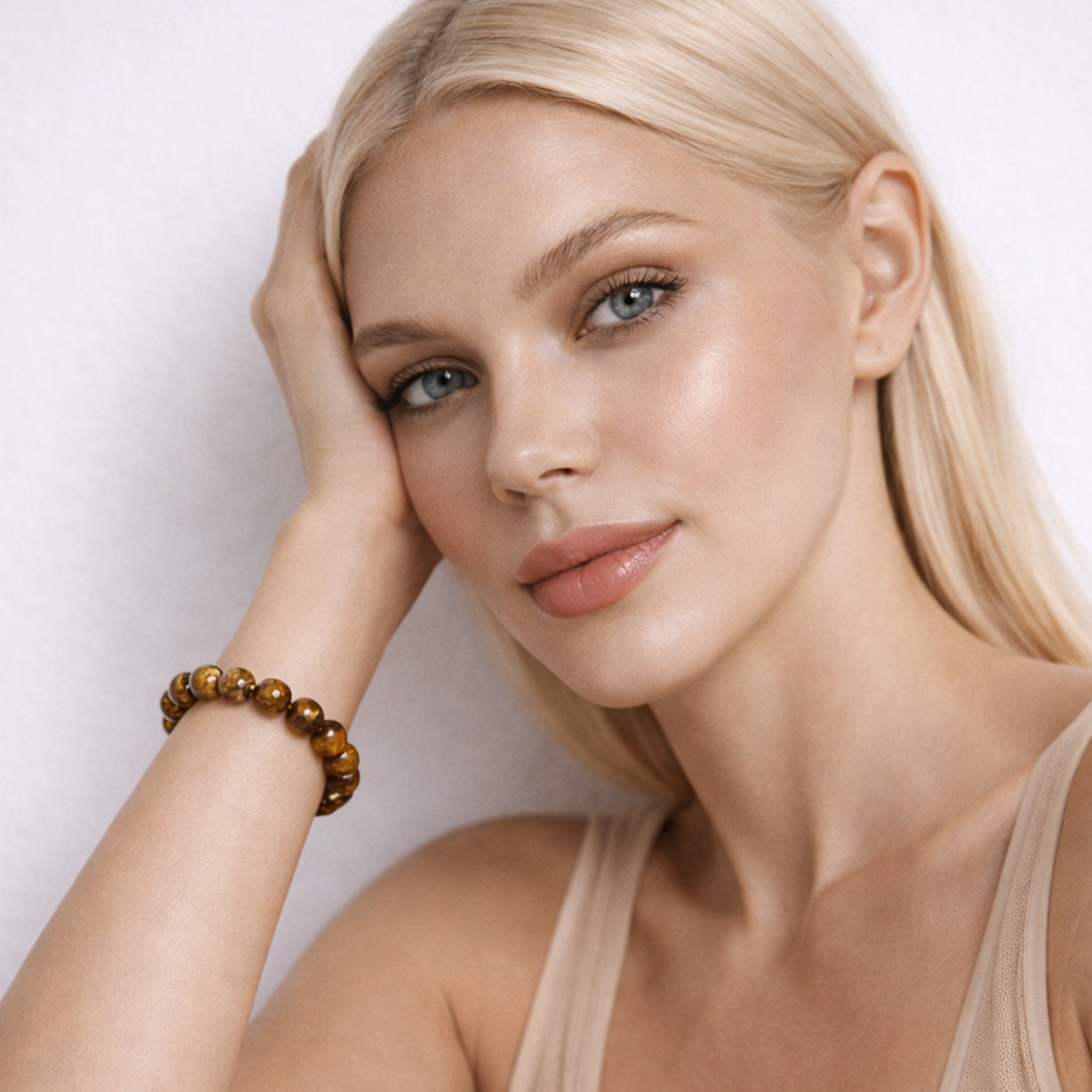 Model wearing tiger’s eye crystal bracelet