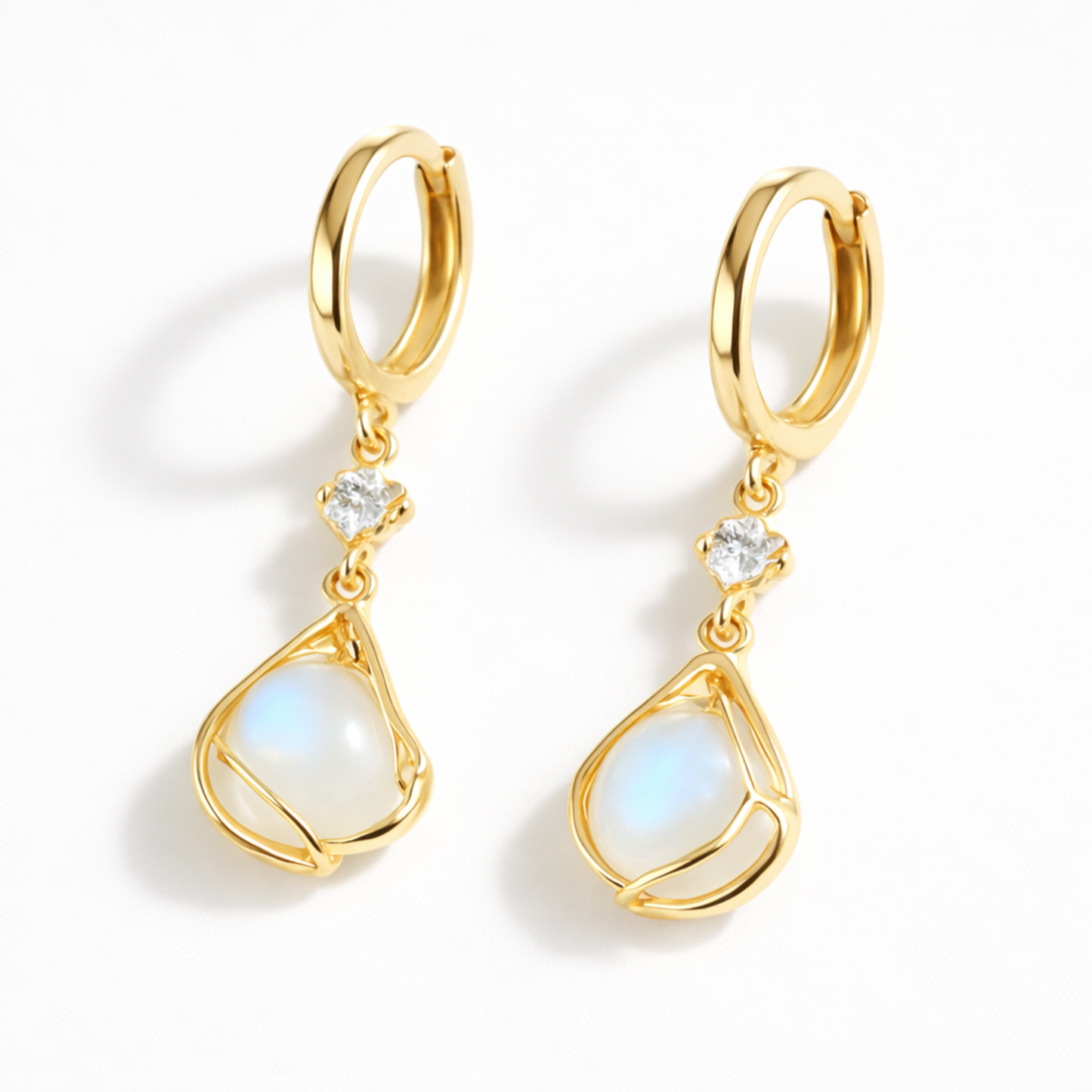 Moonstone earrings white studio background