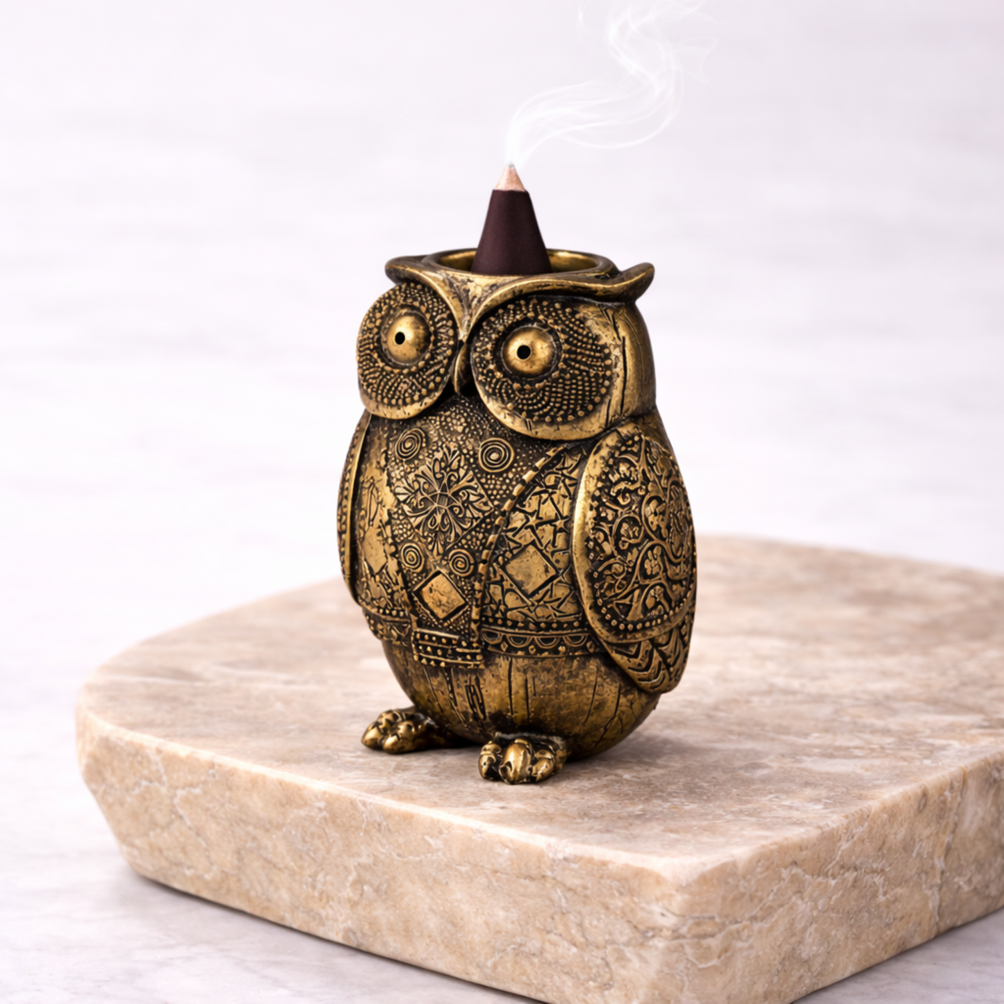 Owl incense burner resin 14cm x 10cm angled side view with incense smoke
