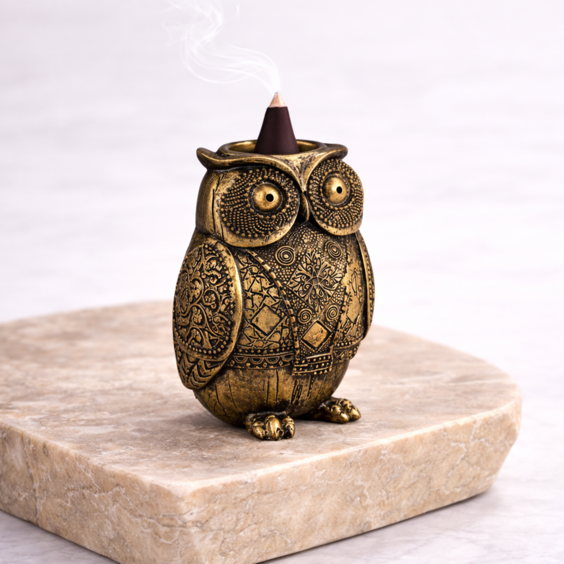 Owl incense burner resin 14cm x 10cm side angle on beige stone slab