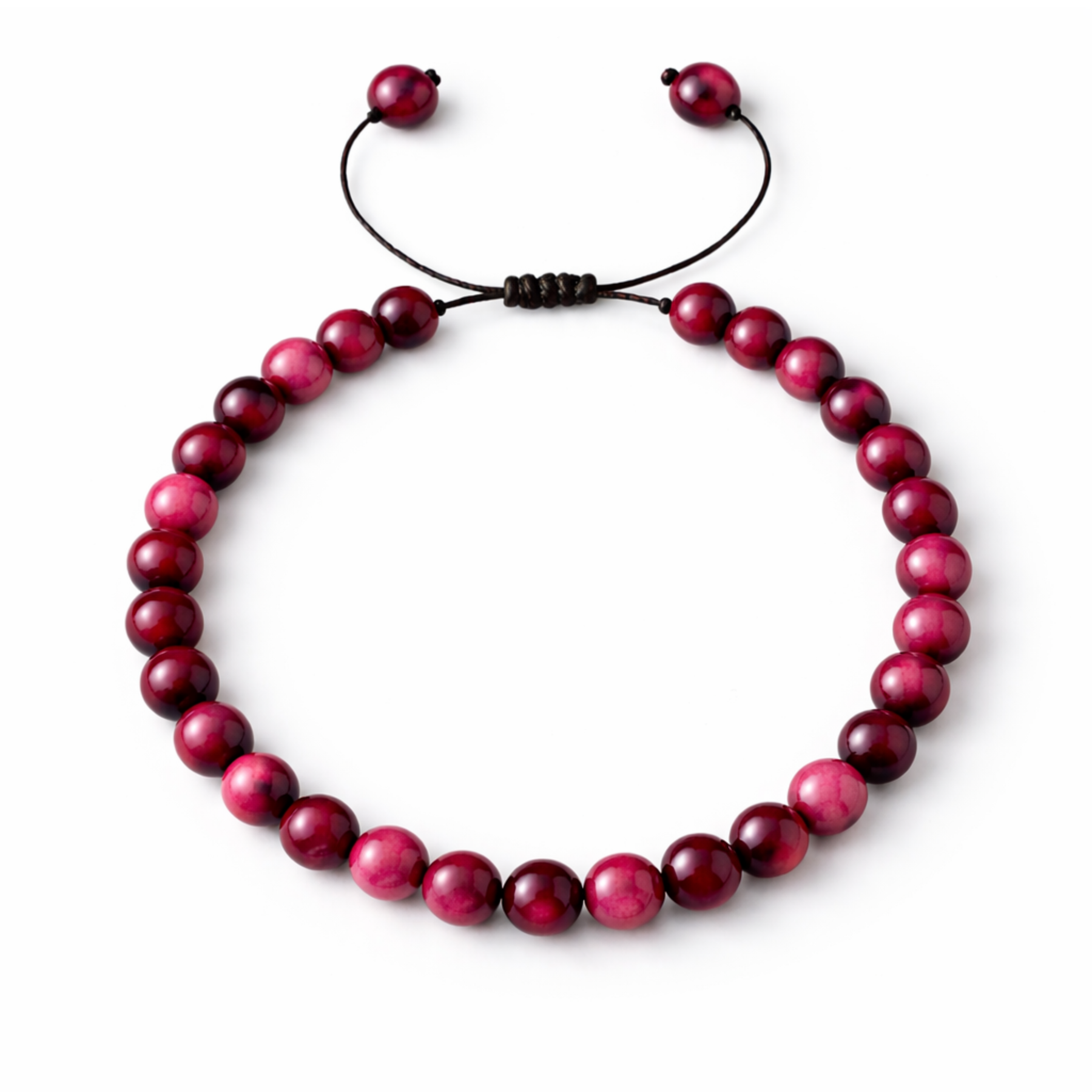 Pink tiger’s eye crystal bead bracelet on white background