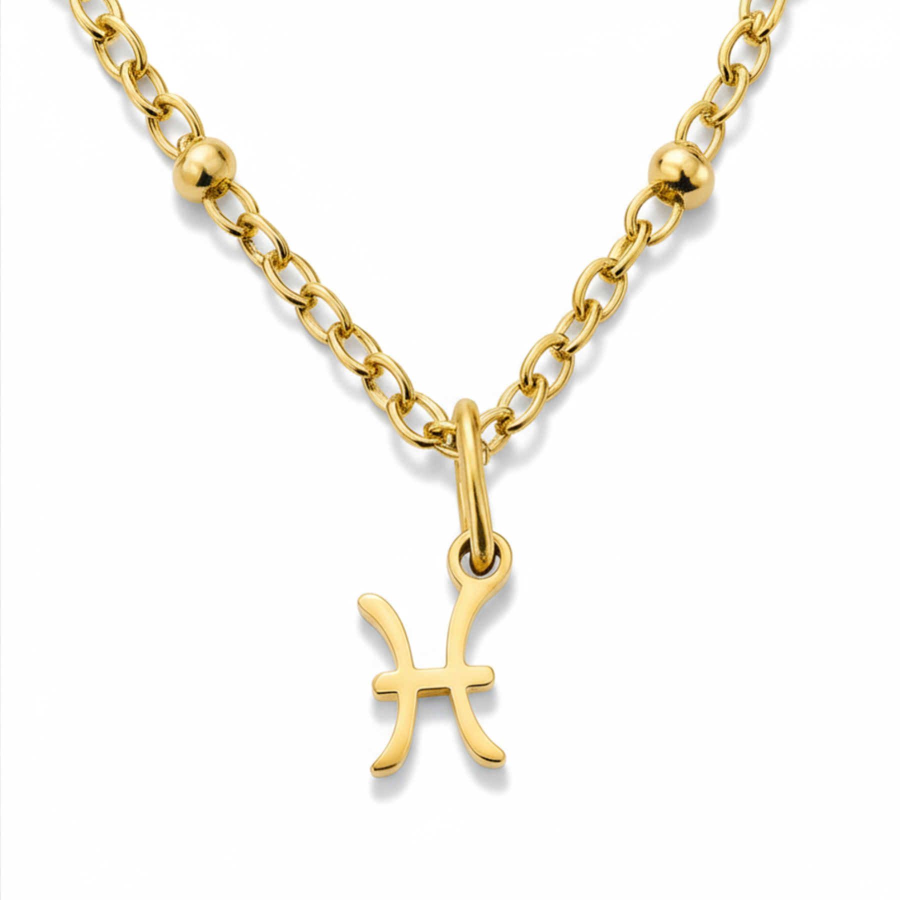 Pisces zodiac necklace gold pendant on gold chain close up by Moon Sutras