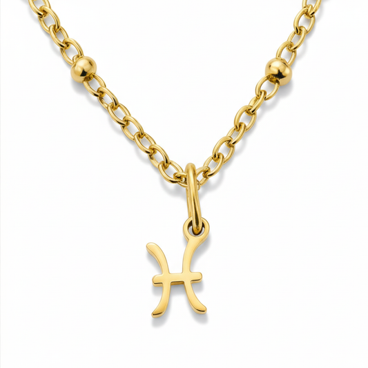 Pisces zodiac necklace gold pendant on gold chain close up by Moon Sutras