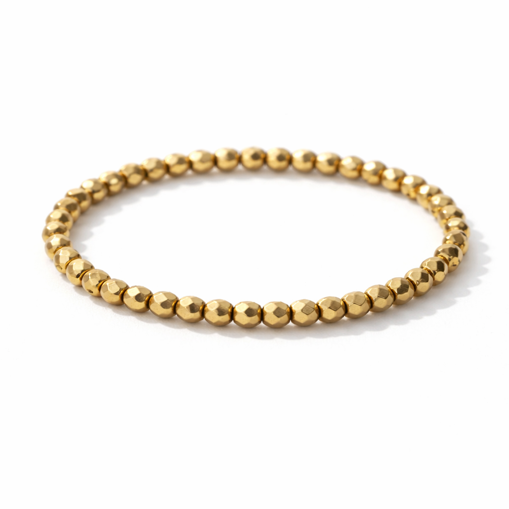 Pyrite faceted bead bracelet on white background