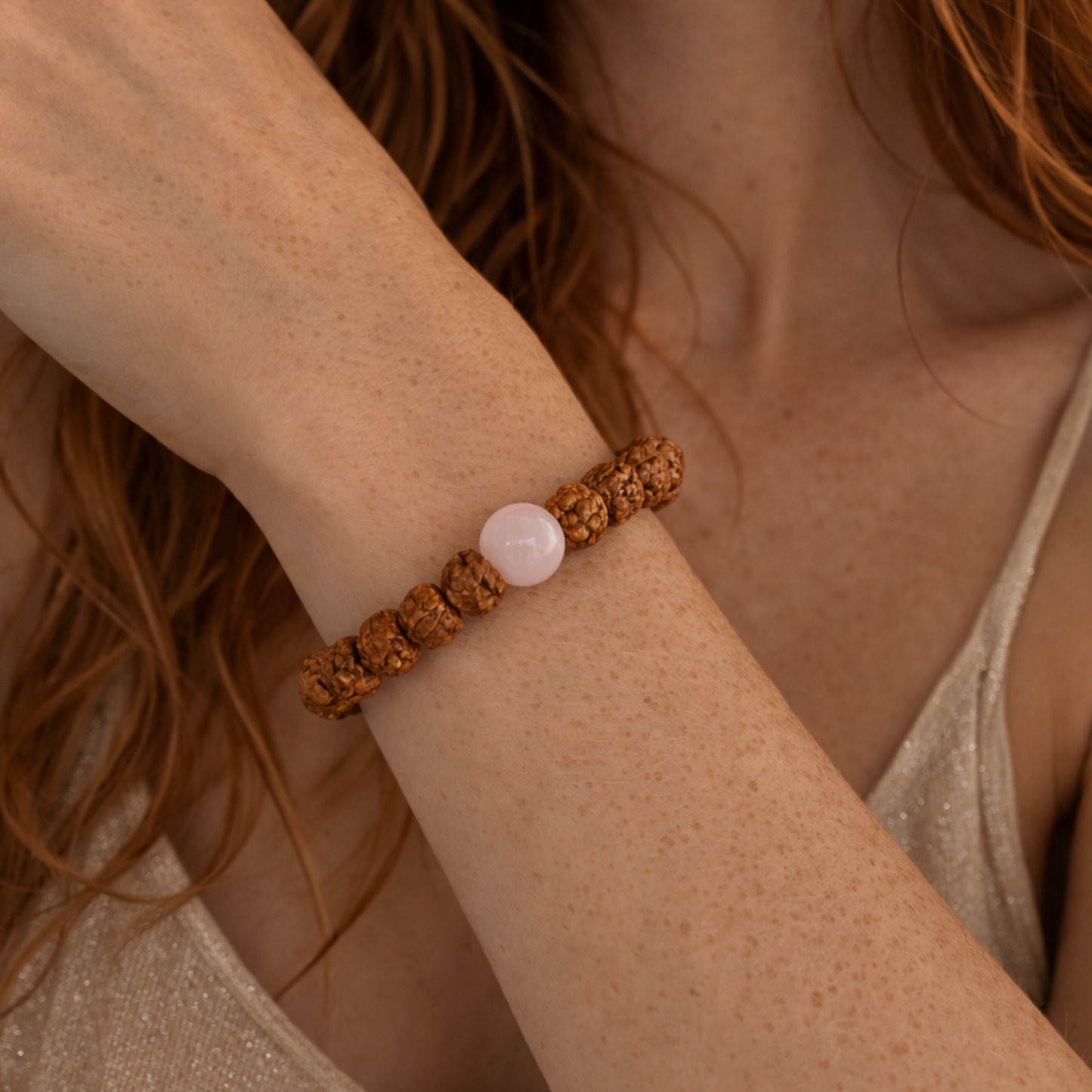 Rudraksha and rose quartz crystal bracelet for protection and love