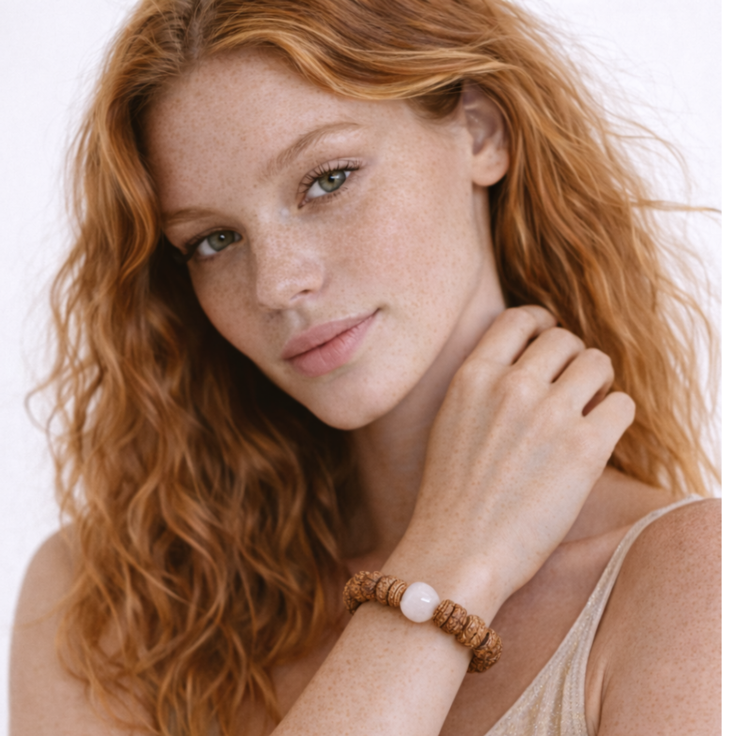 Rudraksha meditation bracelet with rose quartz for protection and emotional balance