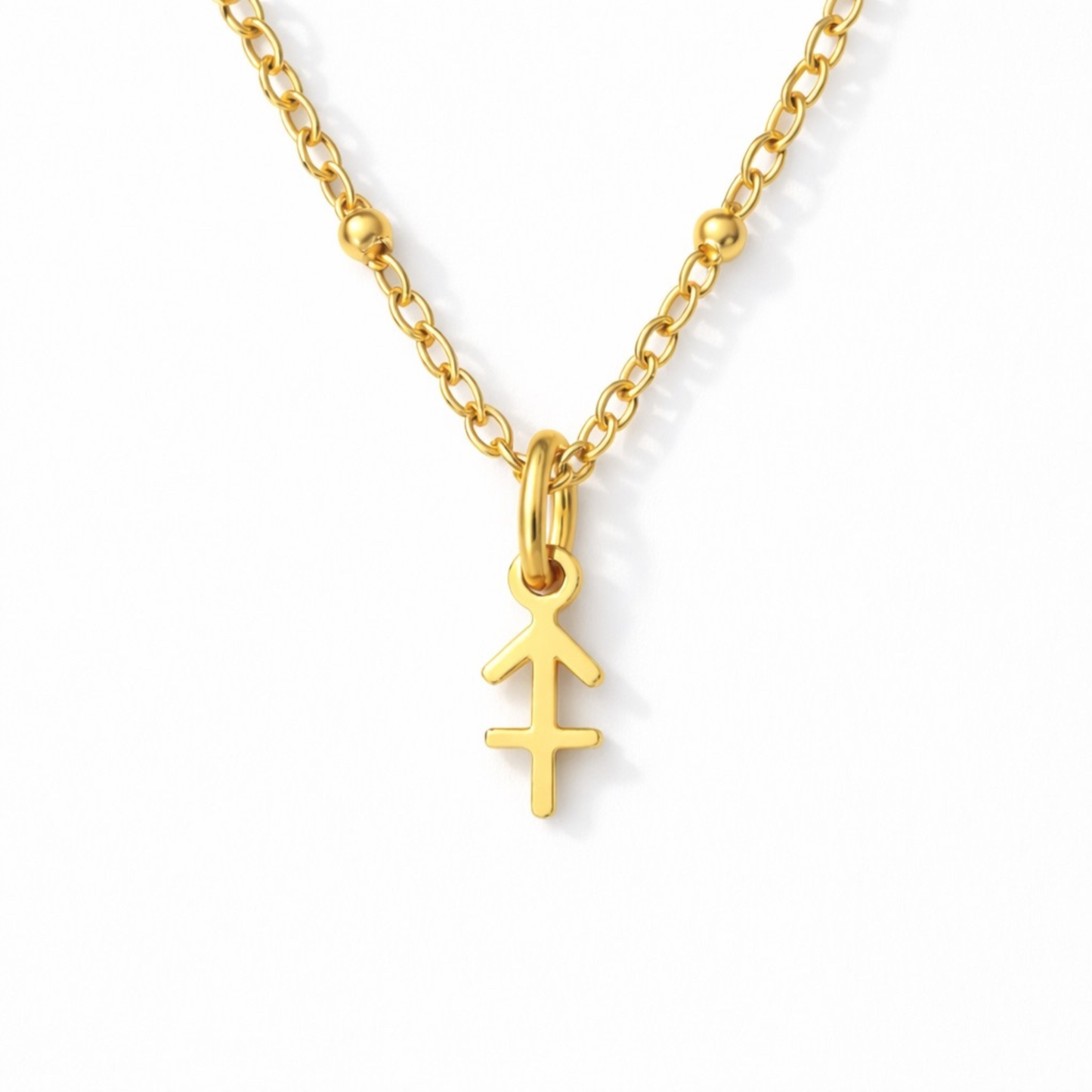 Sagittarius zodiac necklace gold pendant on gold chain close up by Moon Sutras