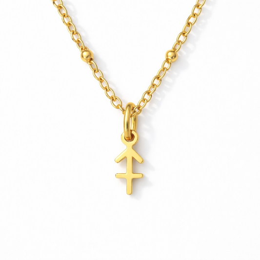 Sagittarius zodiac necklace gold pendant on gold chain close up by Moon Sutras