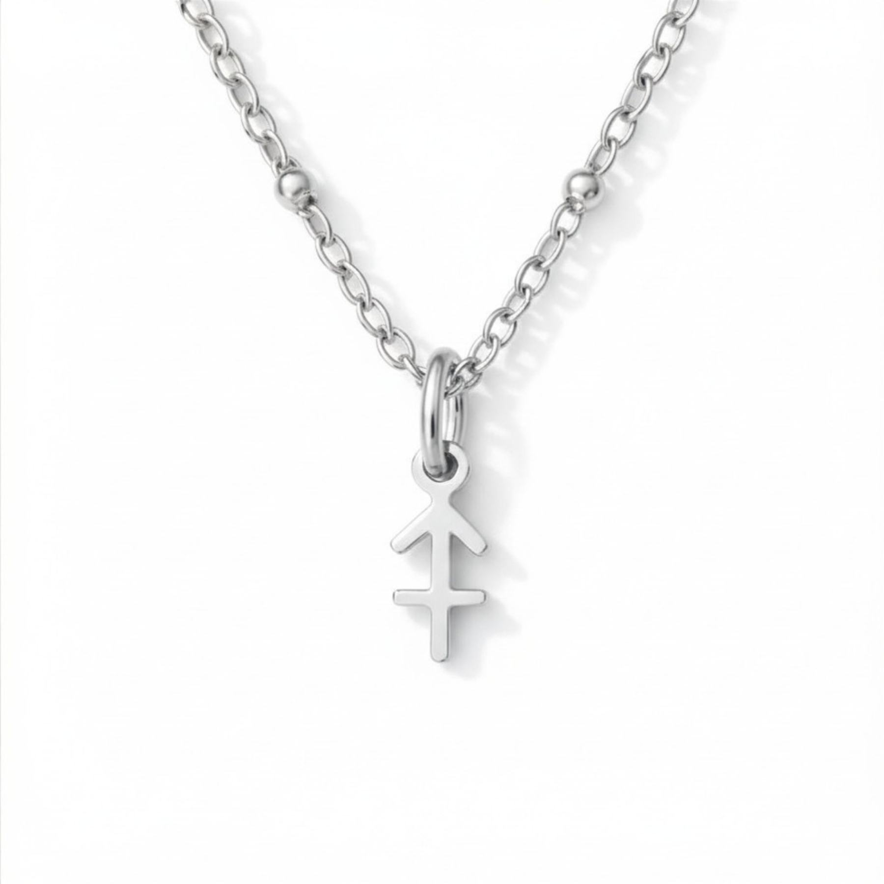 Sagittarius zodiac necklace silver pendant on silver chain close up