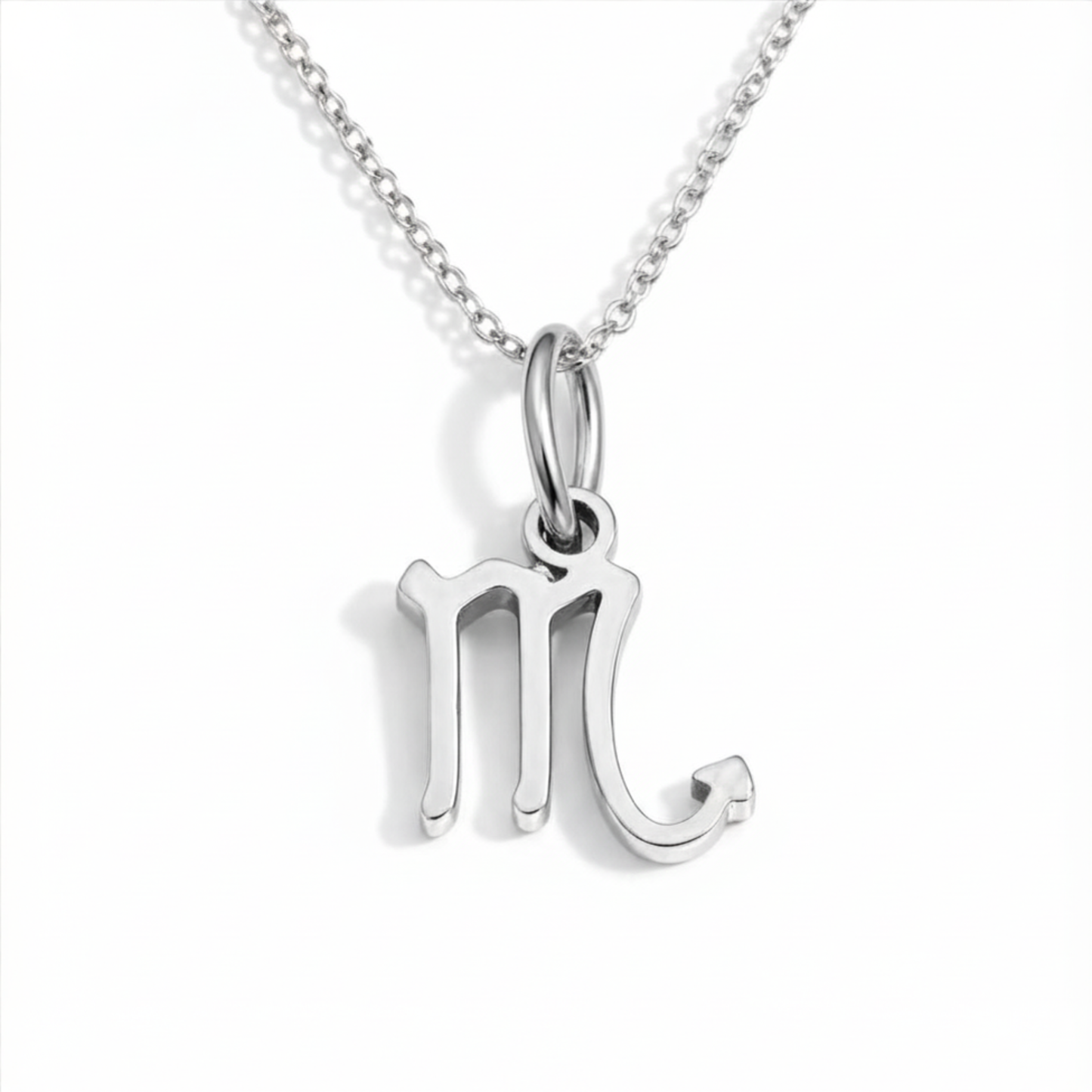 Scorpio zodiac necklace silver pendant on silver chain close up