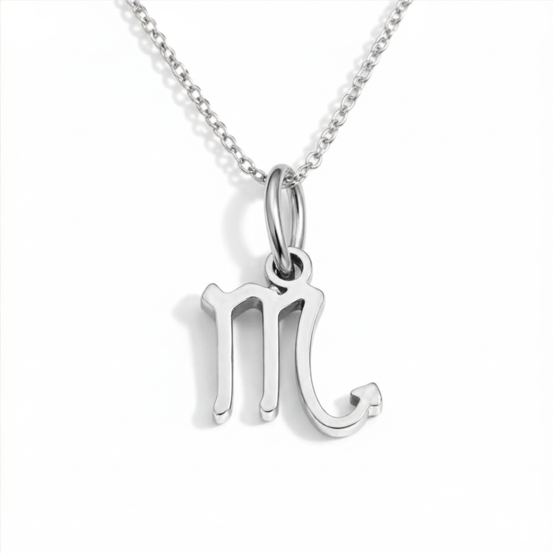 Scorpio zodiac necklace silver pendant on silver chain close up
