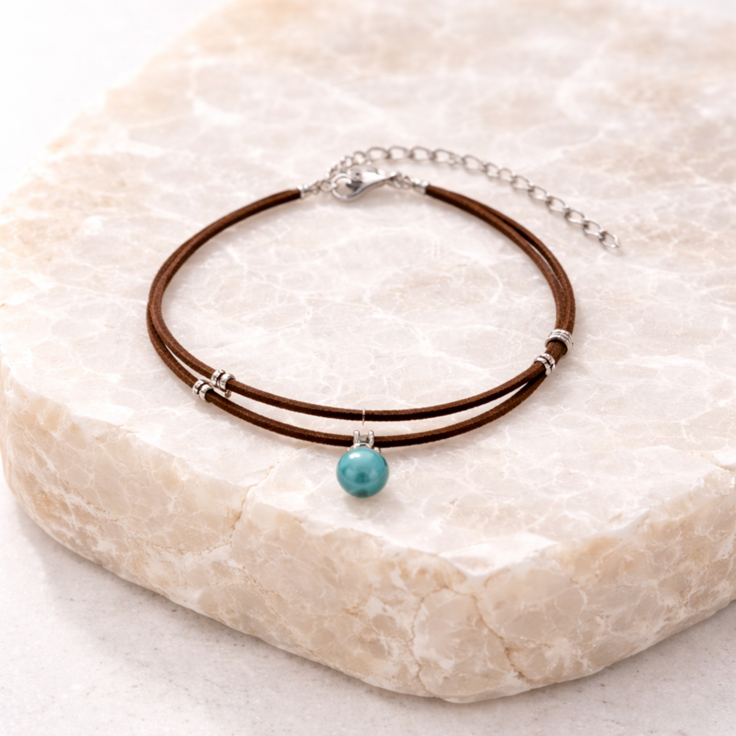 Turquoise anklet on stone display