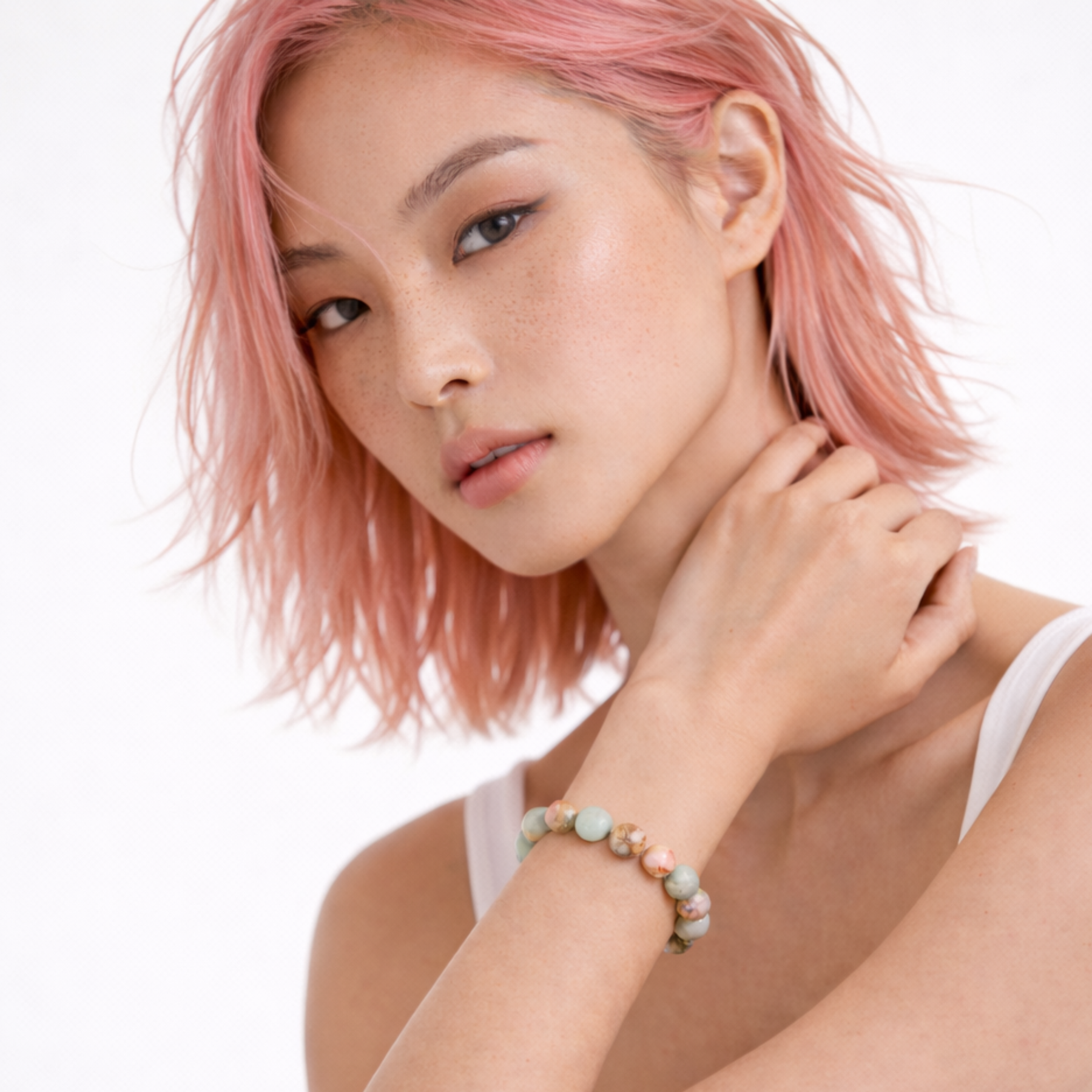 Woman wearing Shoushan  stonecrystal bracelet on wrist