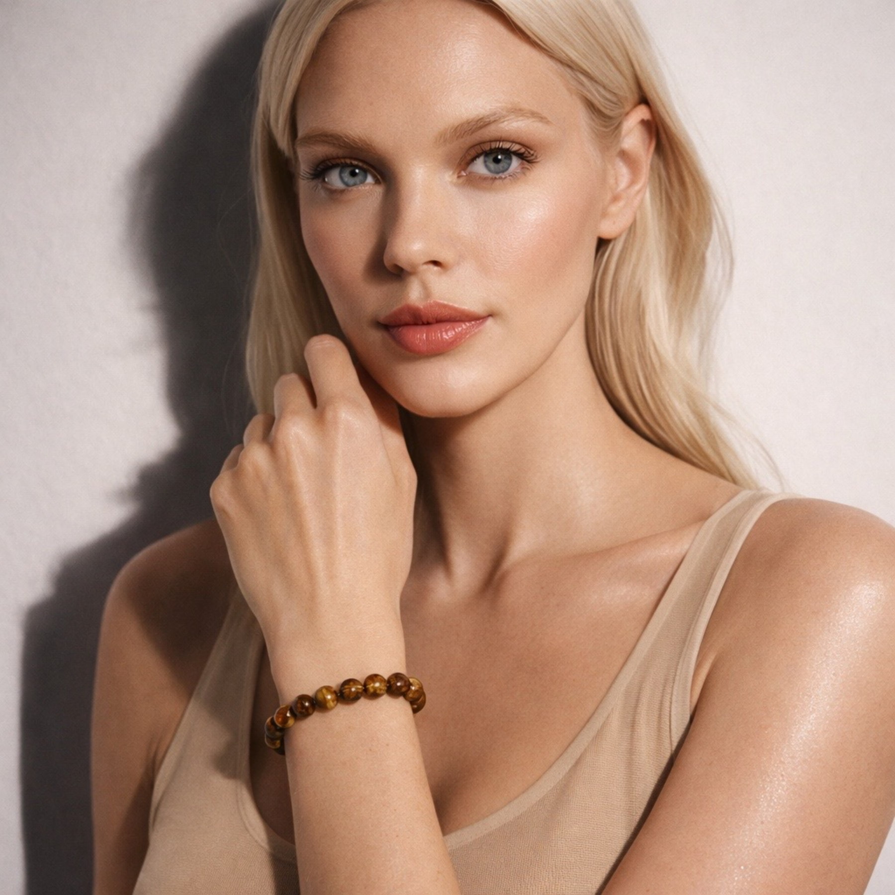 Woman wearing tiger’s eye crystal bracelet