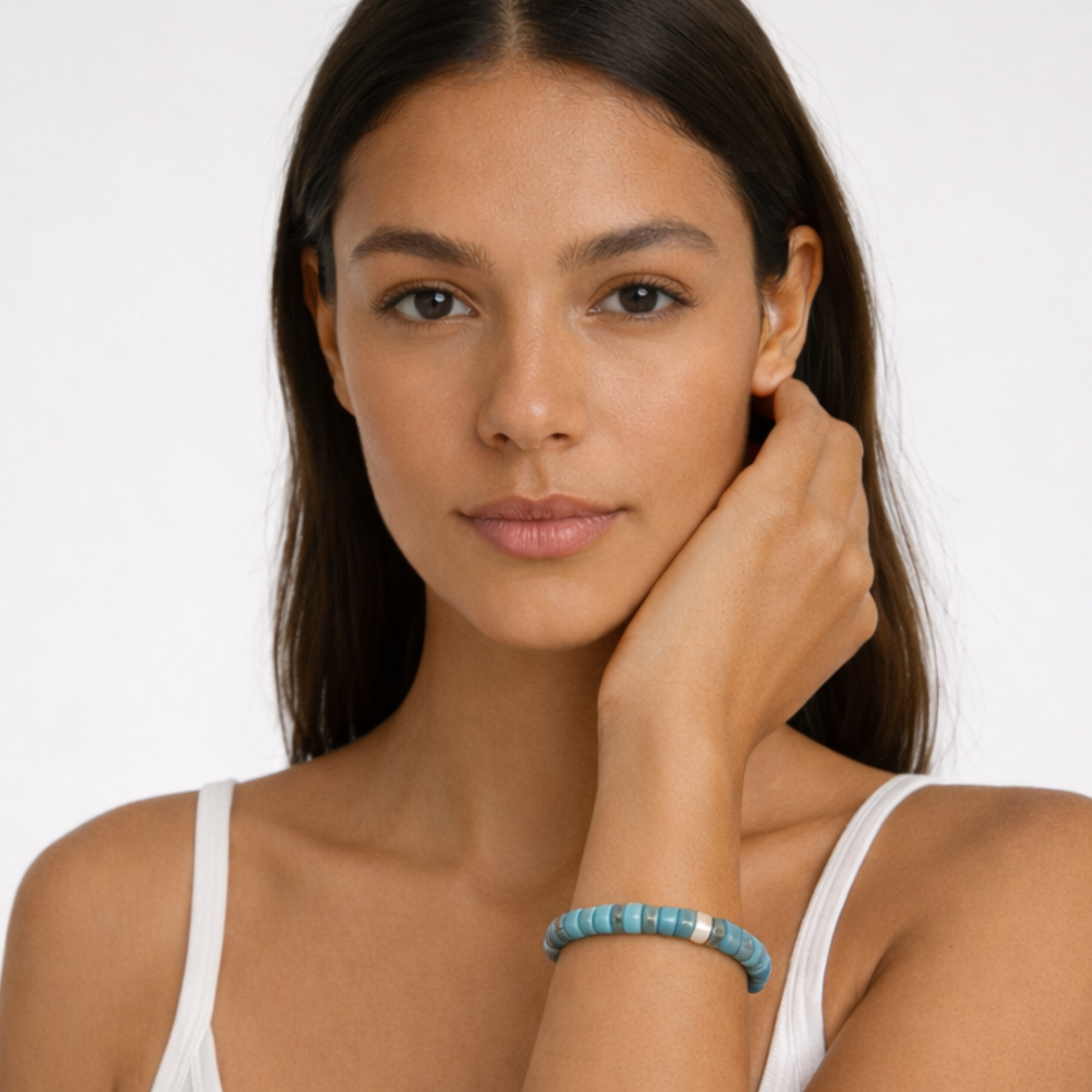 Woman wearing turquoise cord bracelet